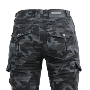 Detail of camouflage motorcycle pants featuring elasticated waist and branded metal plate