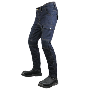 Close-up of motorcycle jeans featuring accordion stretch panels and cargo side pockets