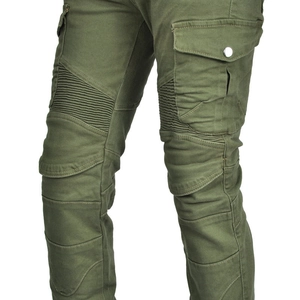 Close-up of military green motorcycle pants showing reinforced knees and cargo pockets