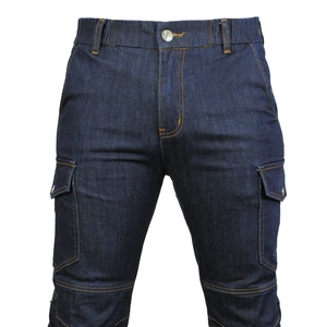 Detail of dark blue motorcycle jeans with orange stitching and large cargo pockets