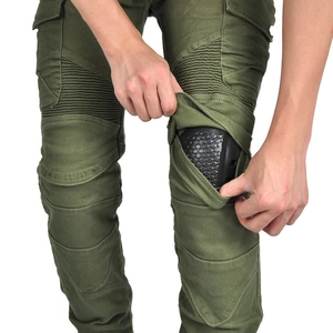 Detail view of military green motorcycle pants with removable honeycomb knee protector pads