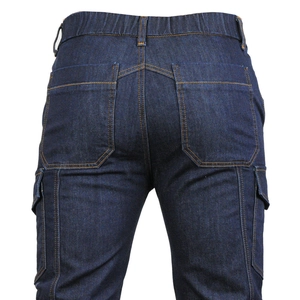 Detail view of motorcycle jeans with elastic waist and cargo pockets in dark blue