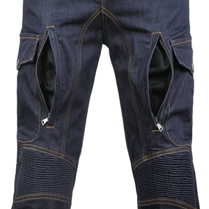 Detail of motorcycle jeans with mesh ventilation zippers and stretch panels on knees