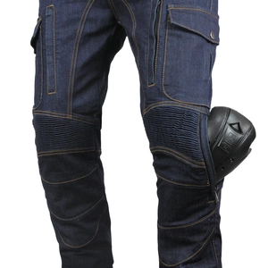 Detail of blue motorcycle jeans featuring a reinforced knee pocket and removable black knee pad