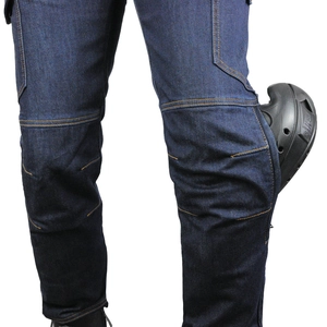 Detail of motorcycle jeans showing knee pocket with removable armor pad installation