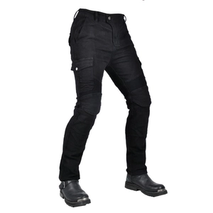 Detail of black motorcycle cargo pants showing reinforced knee pleats and large side pockets