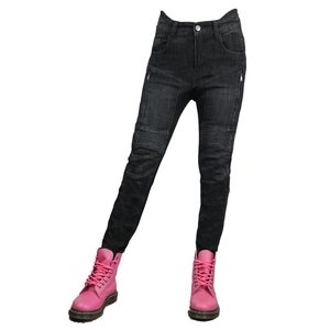 Detail of slim-fit motorcycle jeans with accordion stretch knees and side zippers
