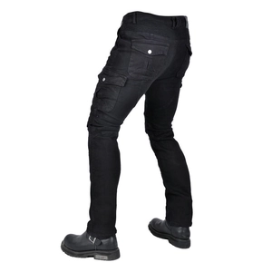 Detail of accordion stretch panels on knees and waist of black motorcycle cargo pants