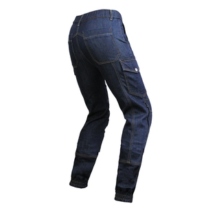 Detail of dark blue motorcycle jeans with reinforced stitching and cargo pockets