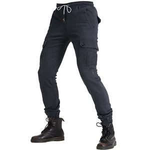 Detail of dark grey motorcycle jogger pants with cargo pockets and elastic cuffs