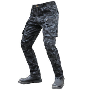 Detail of dark camo motorcycle cargo pants with metallic zipper and durable fabric