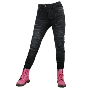 Detail view of motorcycle jeans featuring ribbed knee panels and slim fit design