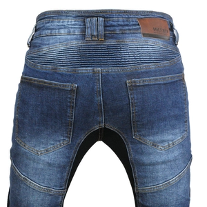 Close-up of motorcycle jeans rear with stretch panels and branded leather patch