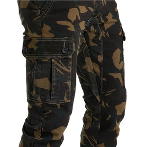 Detail of camouflage motorcycle pants featuring cargo pockets and reinforced stitching
