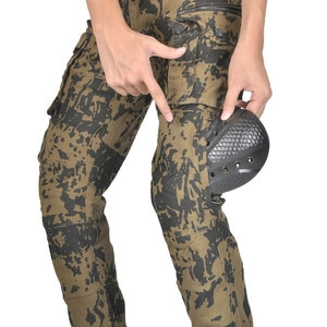 Detail of motorcycle camo pants with tactical knee pads insertion and fabric texture