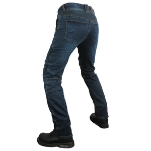 Detail of dark blue motorcycle jeans featuring flexible ribbed panels for bikers