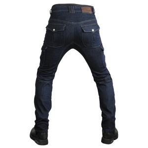 Detail of accordion stretch panels and brown leather logo on blue motorcycle jeans
