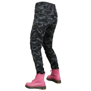 Detail view of women's camouflage motorcycle pants with large cargo pockets and slim fit