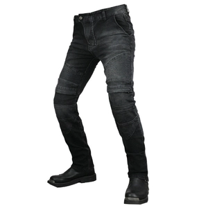 Close-up of accordion stretch panels on black motorcycle jeans for enhanced flexibility
