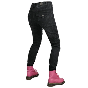 Detail of black motorcycle jeans with pleated stretch panels and side zippers on knees