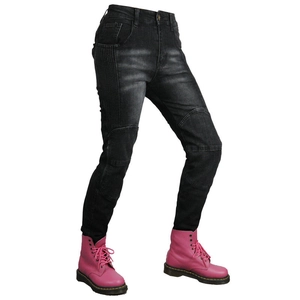 Detail of grey motorcycle jeans showing accordion stretch panels and reinforced knee pads
