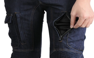 Close-up of thigh zipper ventilation system and orange stitching on motorcycle jeans