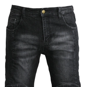 Detail view of motorcycle jeans with ribbed side stitching and metal button
