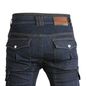 Detail of blue motorcycle jeans featuring elastic accordion panels and rear cargo pockets