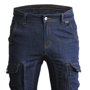Detail of CORDURA denim motorcycle pants featuring yellow contrast stitching and utility pockets