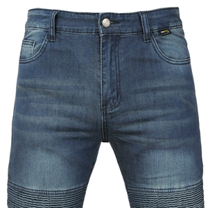 Detail view of motorcycle jeans with Cordura fabric tag and ribbed stretch panels