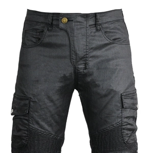 Close-up of charcoal vintage coated motorcycle pants with multi-pockets and knee pleats