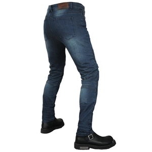 Detail of motorcycle jeans with knee accordion panels and leather logo patch