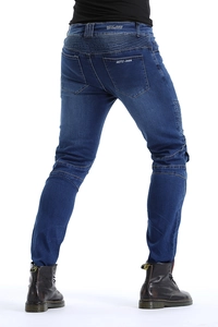 Macro view of motorcycle jeans with accordion stretch panels and brand logo on rear pocket