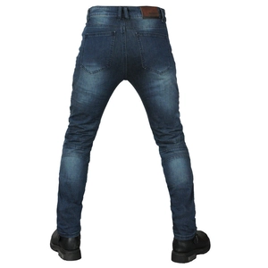Rear view of dark blue motorcycle jeans with ribbed knee panels and brown leather waist patch