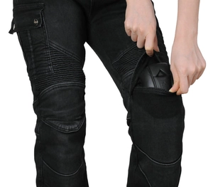 Close-up of motorcycle jeans with reinforced knee stretch panels and removable armor pads