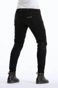 Detail view of black motorcycle jeans featuring protective folds and back pocket branding