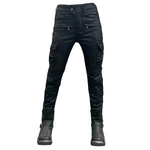 Detail view of motorcycle cargo pants featuring accordion knee pleats and flap pockets