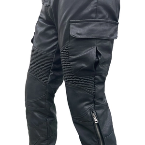 Detail of waterproof motorcycle pants featuring accordion stretch panels and cargo pockets