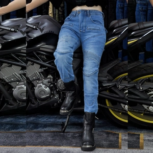 Detail of light blue motorcycle jeans featuring accordion stretch panels and slim fit design