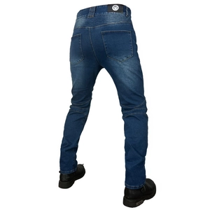 Detail of blue motorcycle jeans featuring accordion stretch panels on the back waist and knees