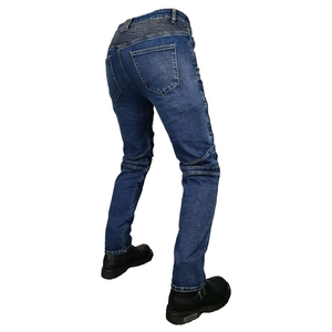 Detail of motorcycle denim jeans with elastic accordion panels for better flexibility