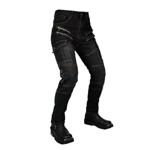 Detail of motorcycle jeans featuring accordion knee panels and metal zipper pockets