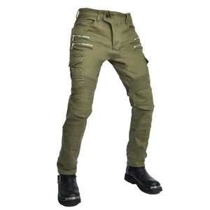 Detail of army green motorcycle cargo pants showing accordion stretch panels and metal zippers