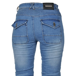 Detail of light blue motorcycle jeans with accordion stretch panels and rear flap pockets