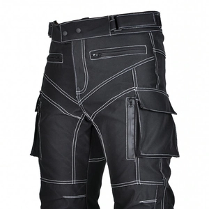 Close-up of waterproof zipper pocket and white contrast stitching on black motorcycle pants