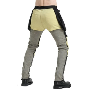 Rear view of motorcycle pants featuring yellow and green panels with reinforced stitching