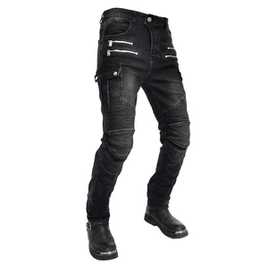 Detail of slim biker jeans with ribbed knee panels, cargo pockets, and zipper hardware