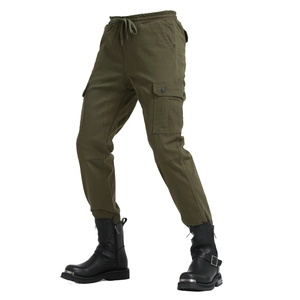 Detail of army green cargo biker pants with elastic drawstring waist and side pockets