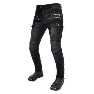 Detail of motorcycle slim denim pants with zipper pockets and ribbed knee panels