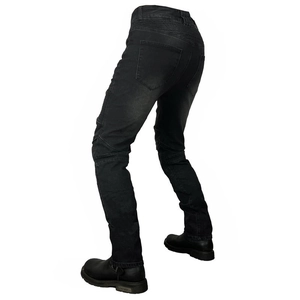 Detail of stretch ribbing and pleated panels on men's vintage motorcycle riding jeans